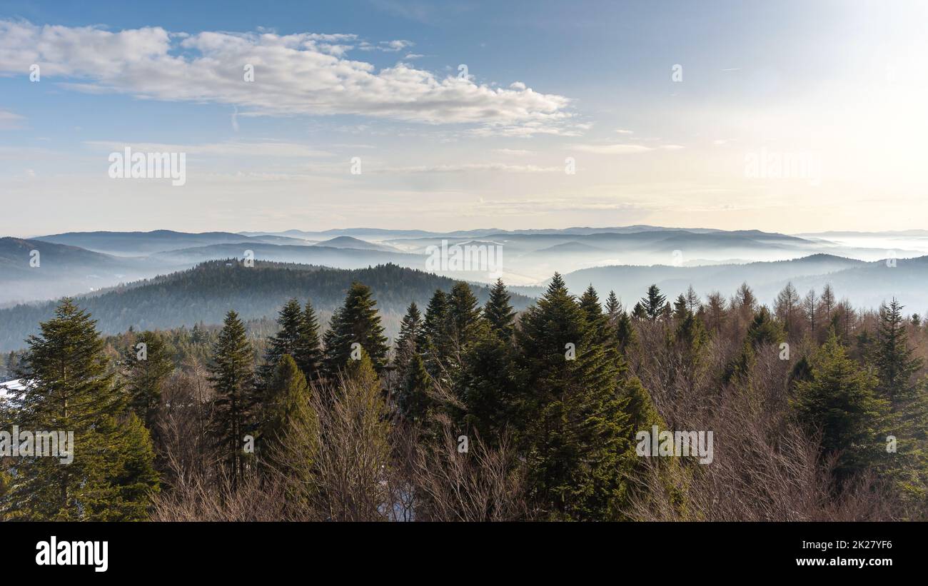 Foggy view of Beskid Sadecki mountain range in Poland Stock Photo