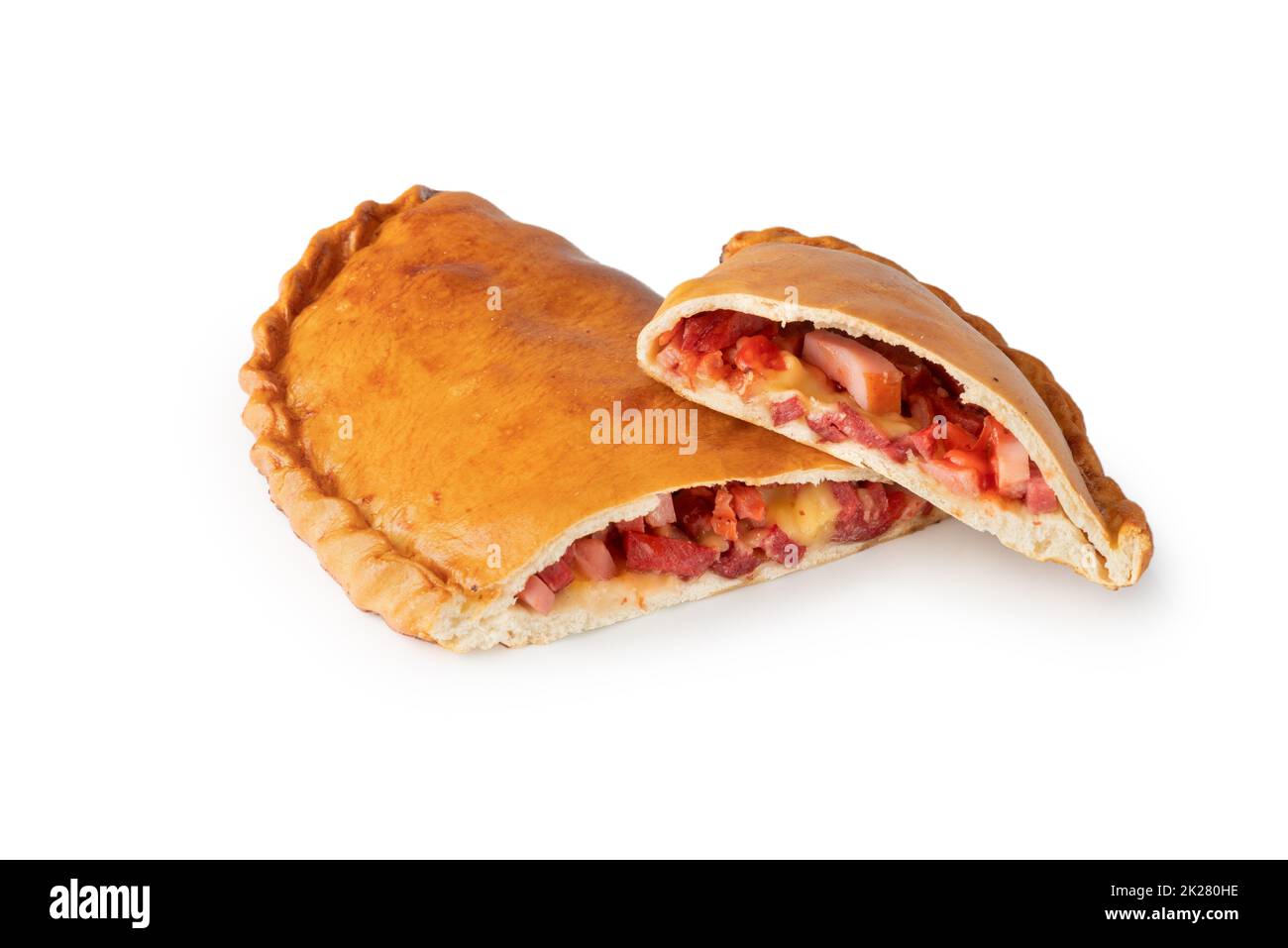 Pepperoni and cheese filled calzone pizza isolated on a white