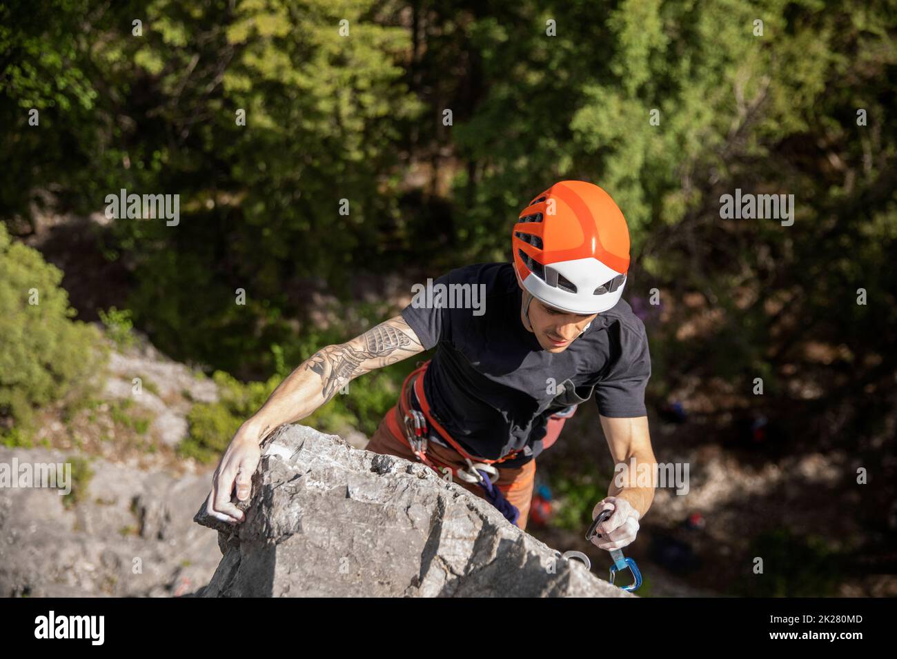 Rock climber man helmet hi-res stock photography and images - Alamy