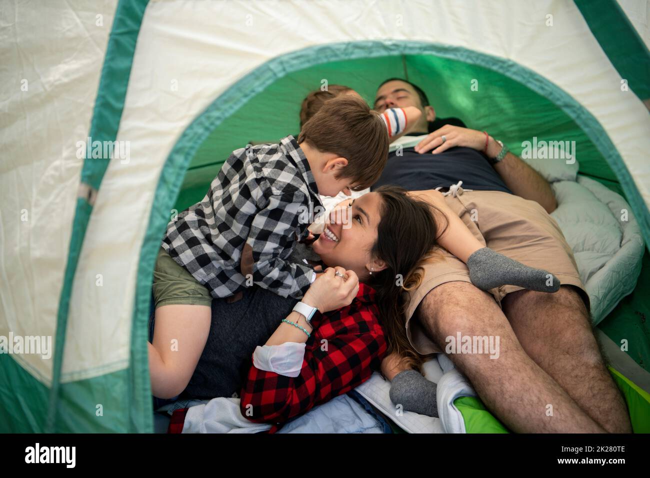 Woman happy camping tent hi-res stock photography and images - Alamy