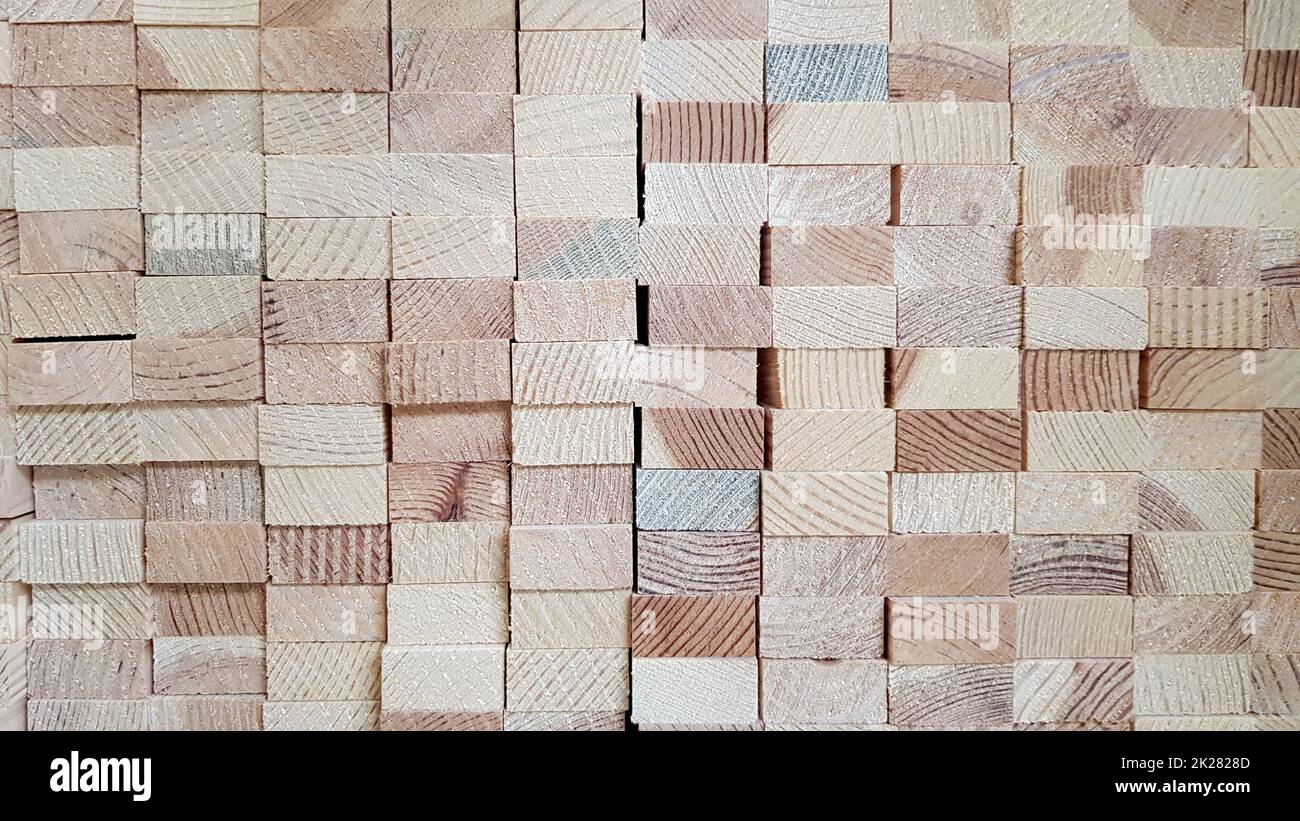 Wood texture background. Lumber industrial wood texture. End end made from machined wooden beam. Glued pine timber beams for wooden windows closeup Stock Photo