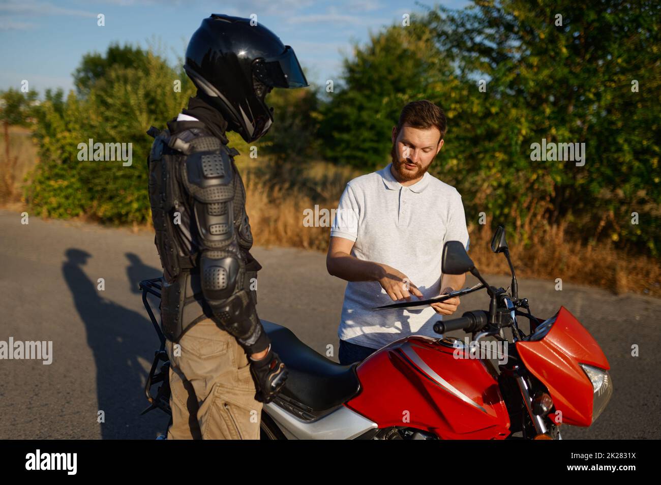 Driving lesson on motordrome, motorcycle school Stock Photo