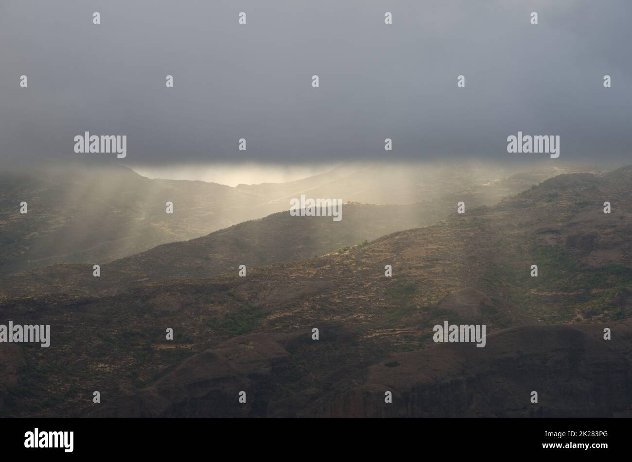 Lights illuminating the landscape on a stormy day. Stock Photo