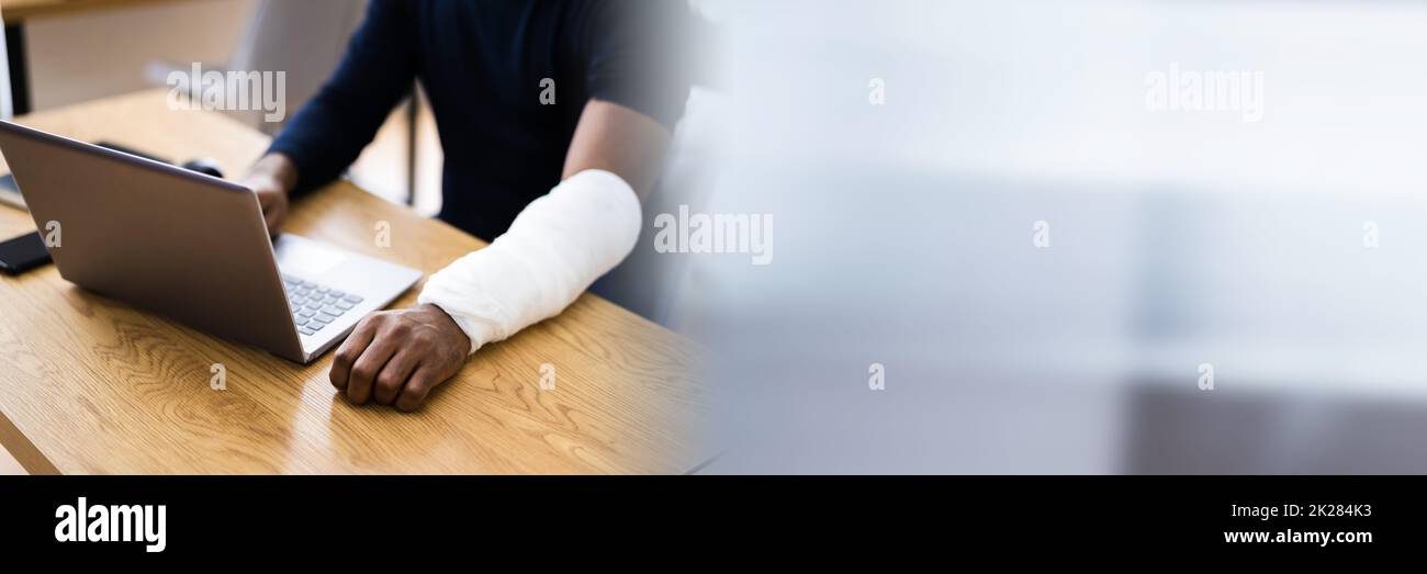 Injured Worker Compensation. Broken Arm African Man Stock Photo