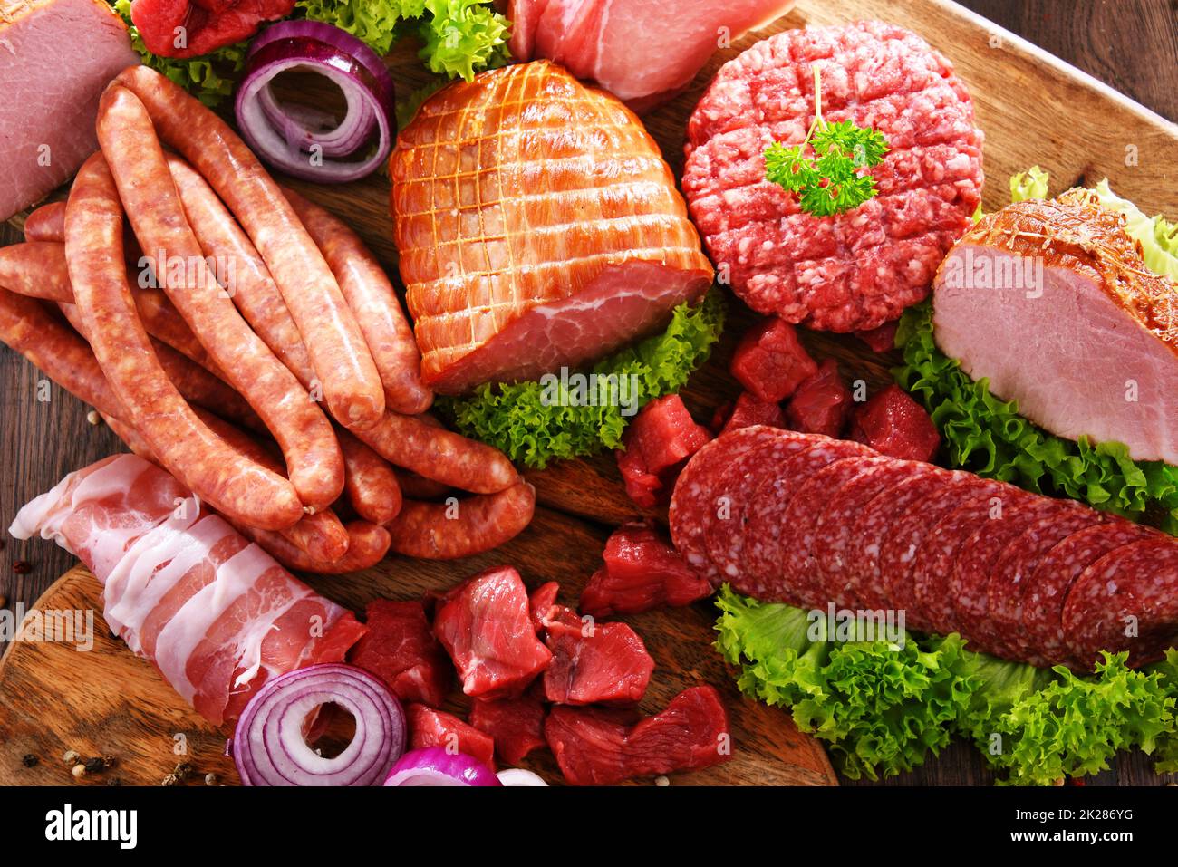 Composition with assorted meat products Stock Photo Alamy