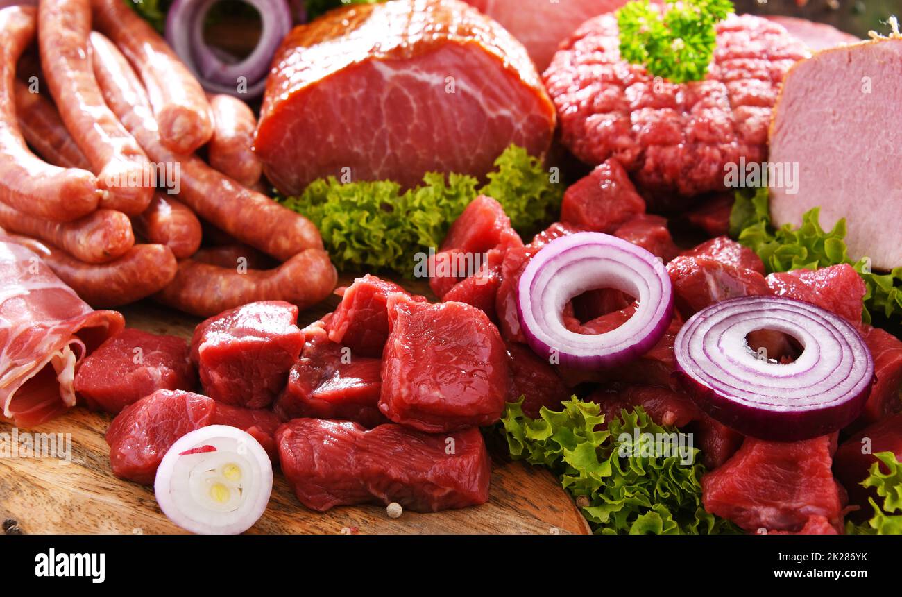 Composition with assorted meat products Stock Photo Alamy