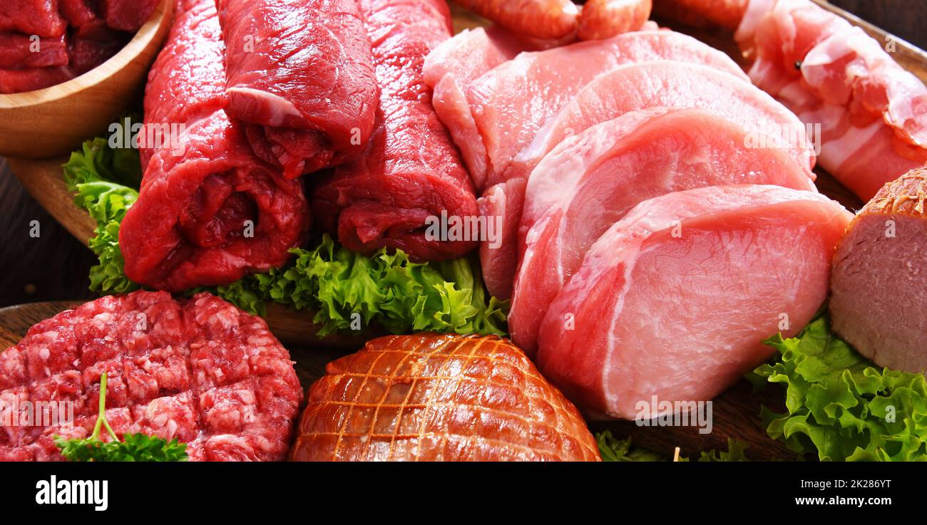 Composition with assorted meat products Stock Photo Alamy