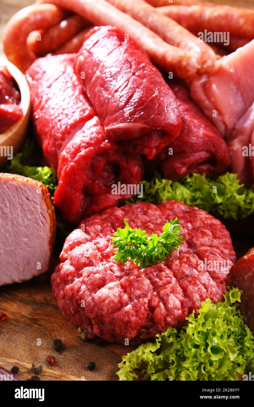 Composition with assorted meat products Stock Photo - Alamy
