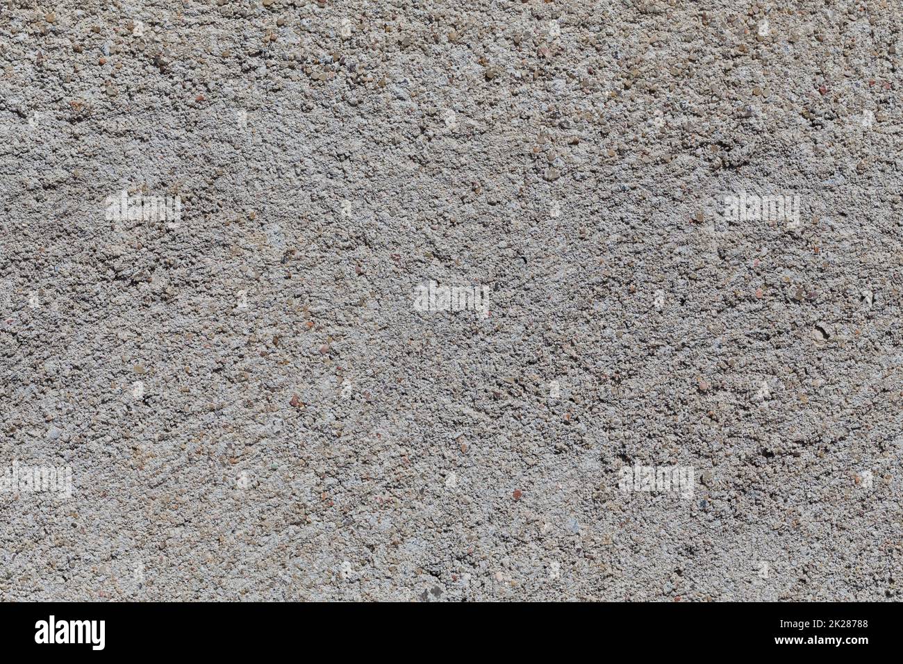 Crushed granite stones wall - close up Stock Photo