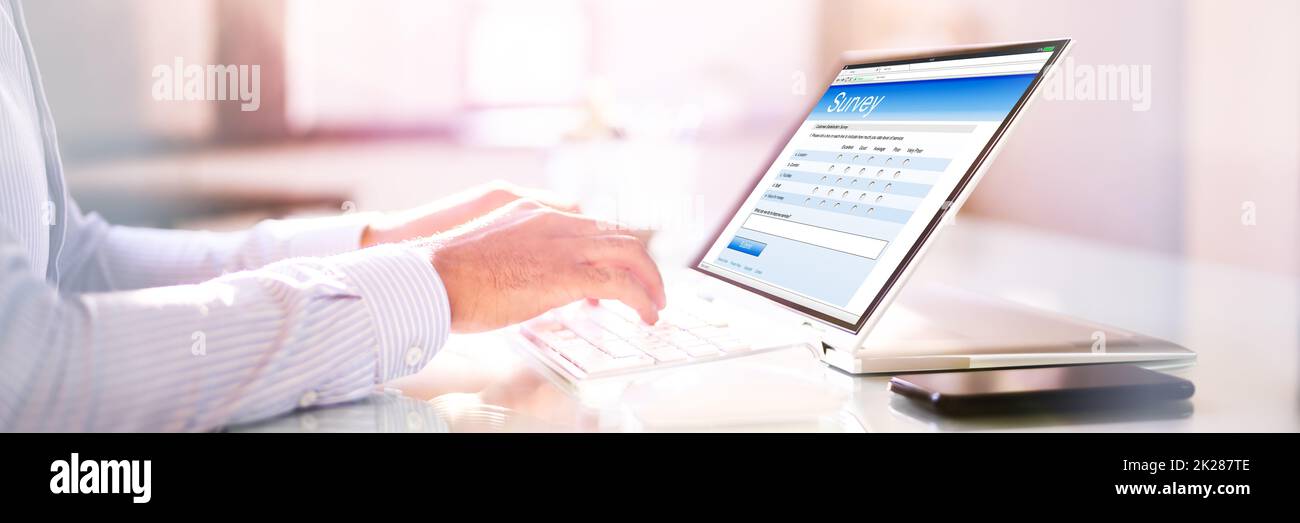 African Man Filling Survey Poll Or Form Stock Photo - Alamy