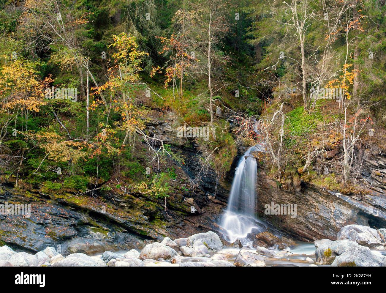 Small waterfall near the Swiss village Vulpera Stock Photo