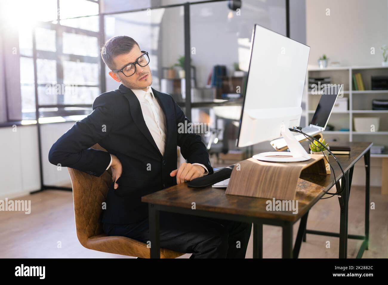 Bad Posture Office Desk Chair Back Stock Photo