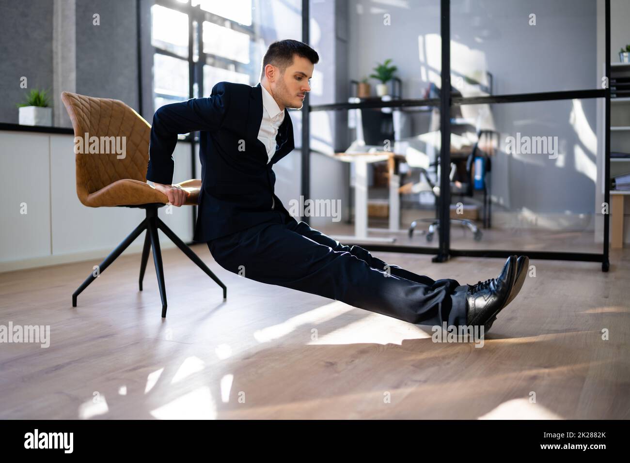 Triceps Dips Exercise Using Chair Stock Photo Alamy