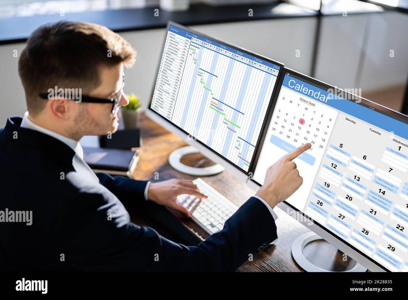 Man Working On Calendar Agenda Schedule Stock Photo