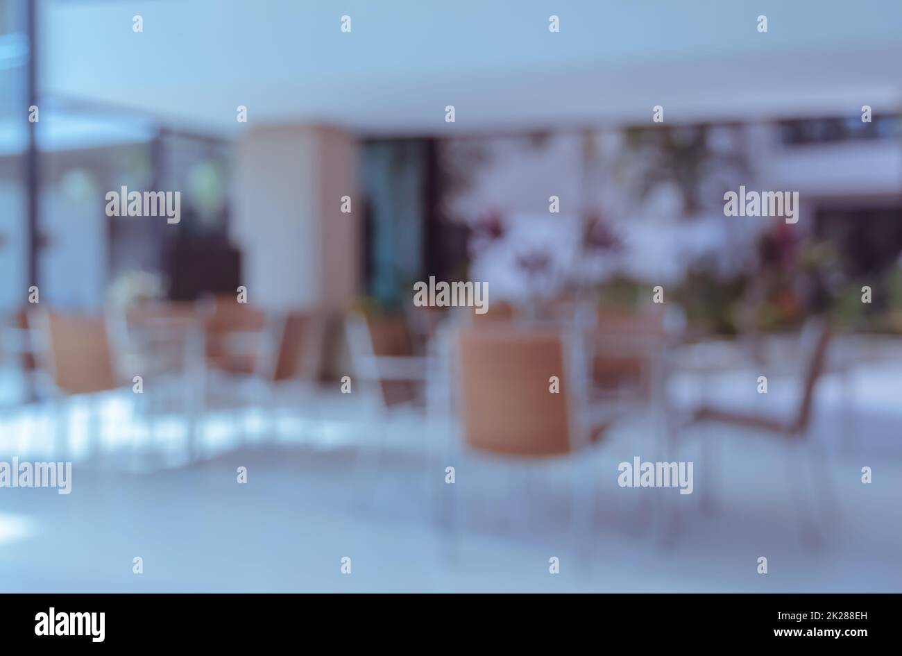 Empty chairs and table in coffee shop, blur background image Stock Photo