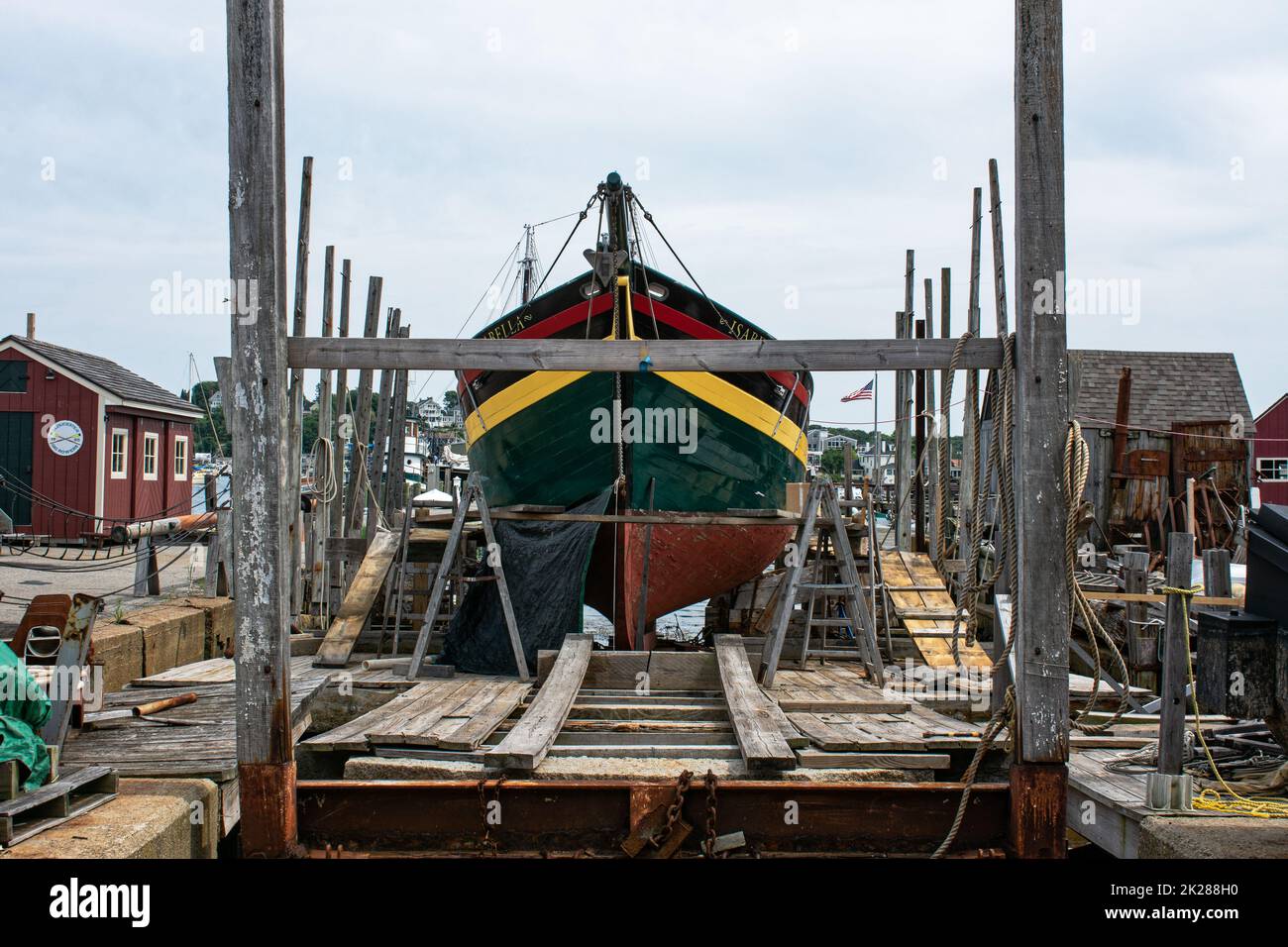 The Isabella a vintage wooden ship in drydock in Gloucester Harbor, Massachusetts. Stock Photo