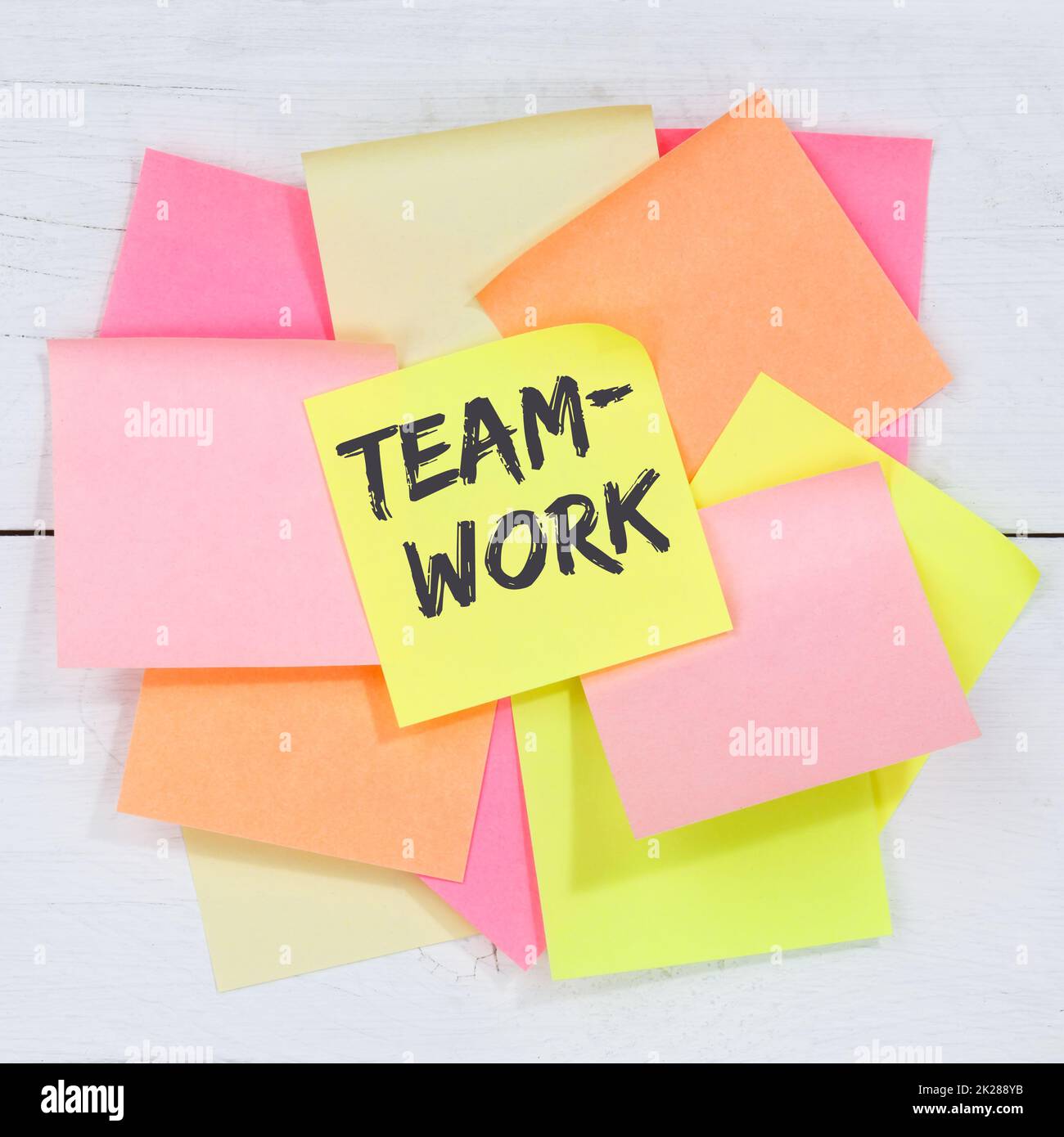 Teamwork team working together business concept desk note paper Stock Photo