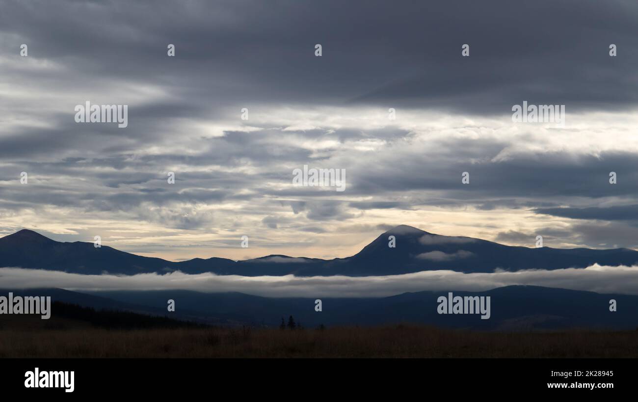 Autumn evening landscape in the Carpathians with mountain peaks. Carpathians, Ukraine, Europe. World of beauty. Stock Photo