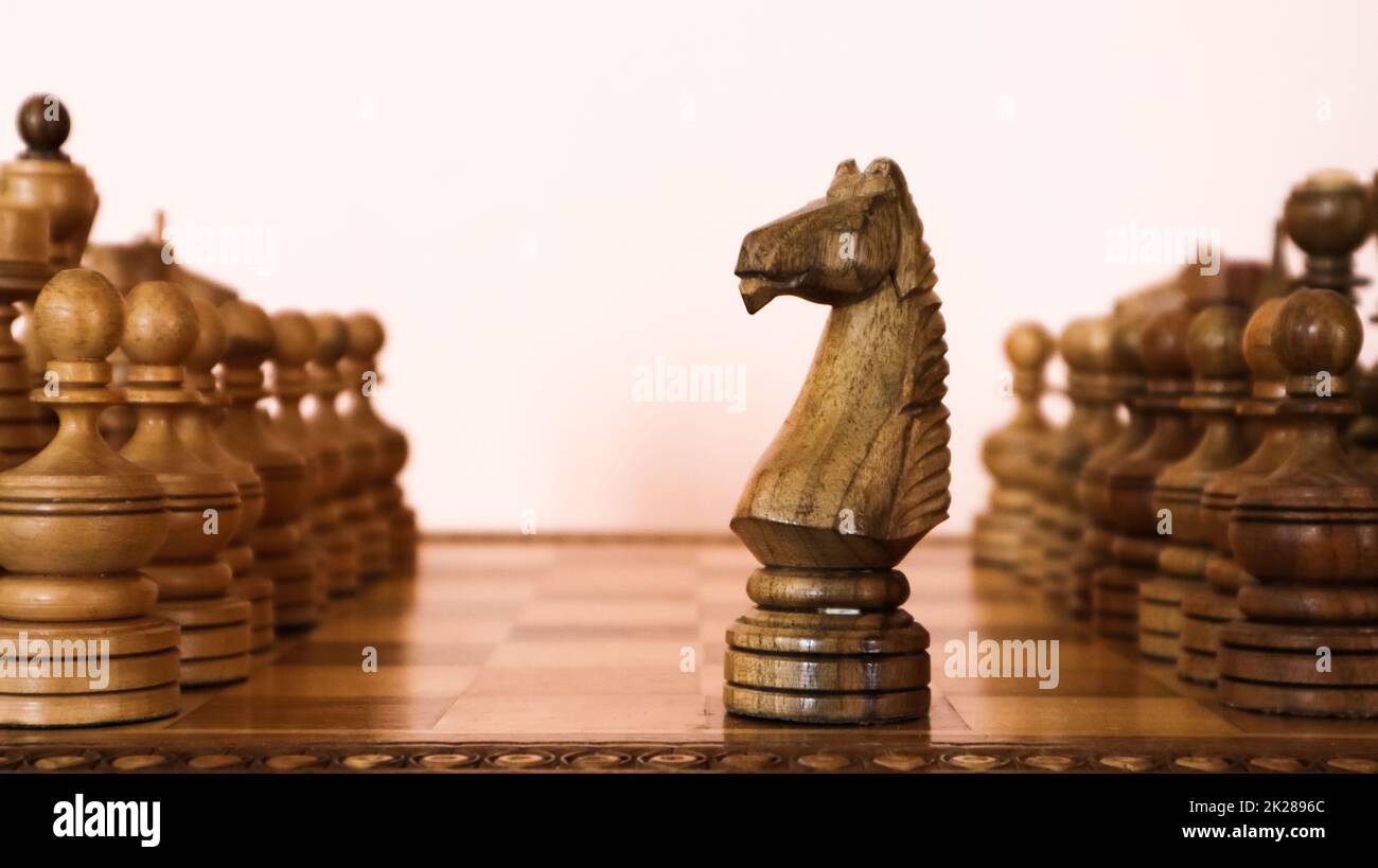 brown chess board with figures on a wooden table in a cafe, playing chess  Stock Photo - Alamy