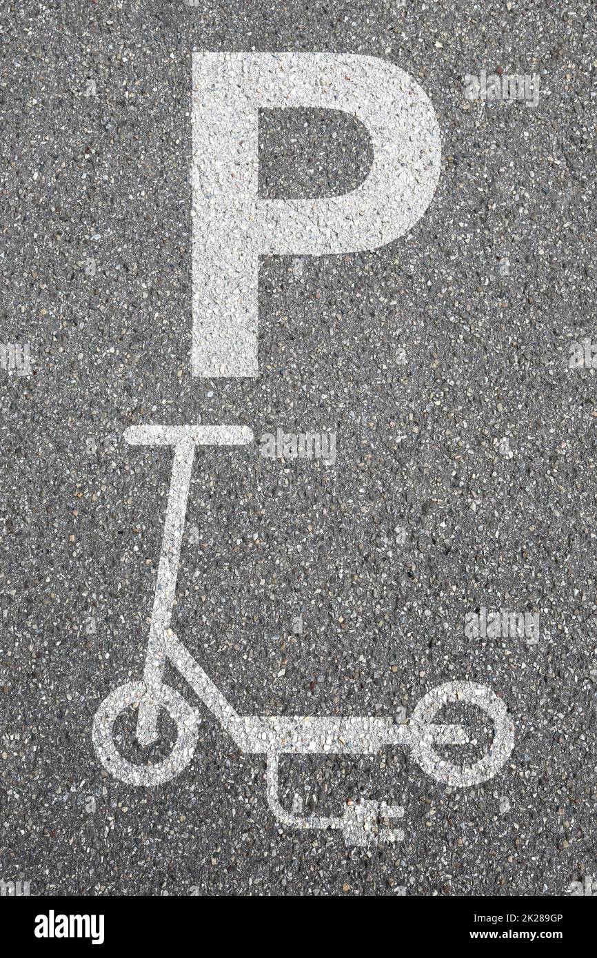 Parking lot sign electric scooter e-scooter road portrait format eco friendly mobility city transport Stock Photo