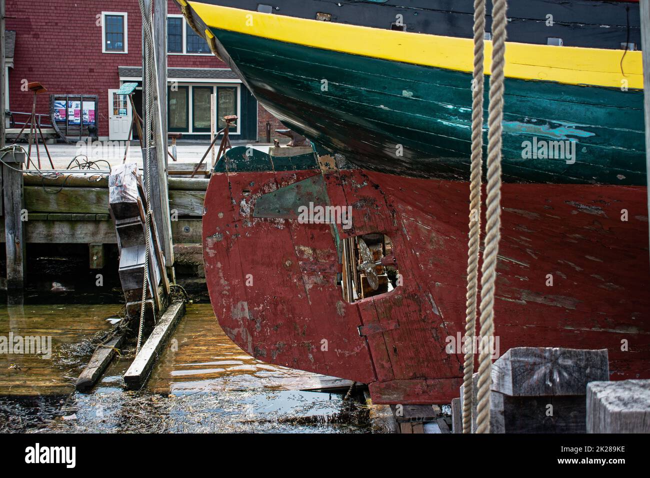 The Isabella a vintage wooden ship in drydock in Gloucester Harbor, Massachusetts. Stock Photo