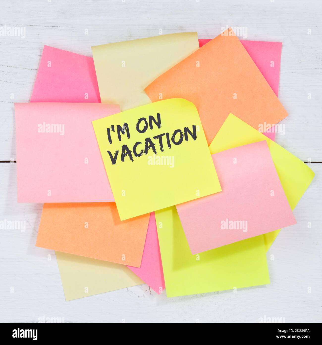 I'm on vacation travel traveling holiday holidays relax relaxed break free time business concept desk note paper notepaper Stock Photo