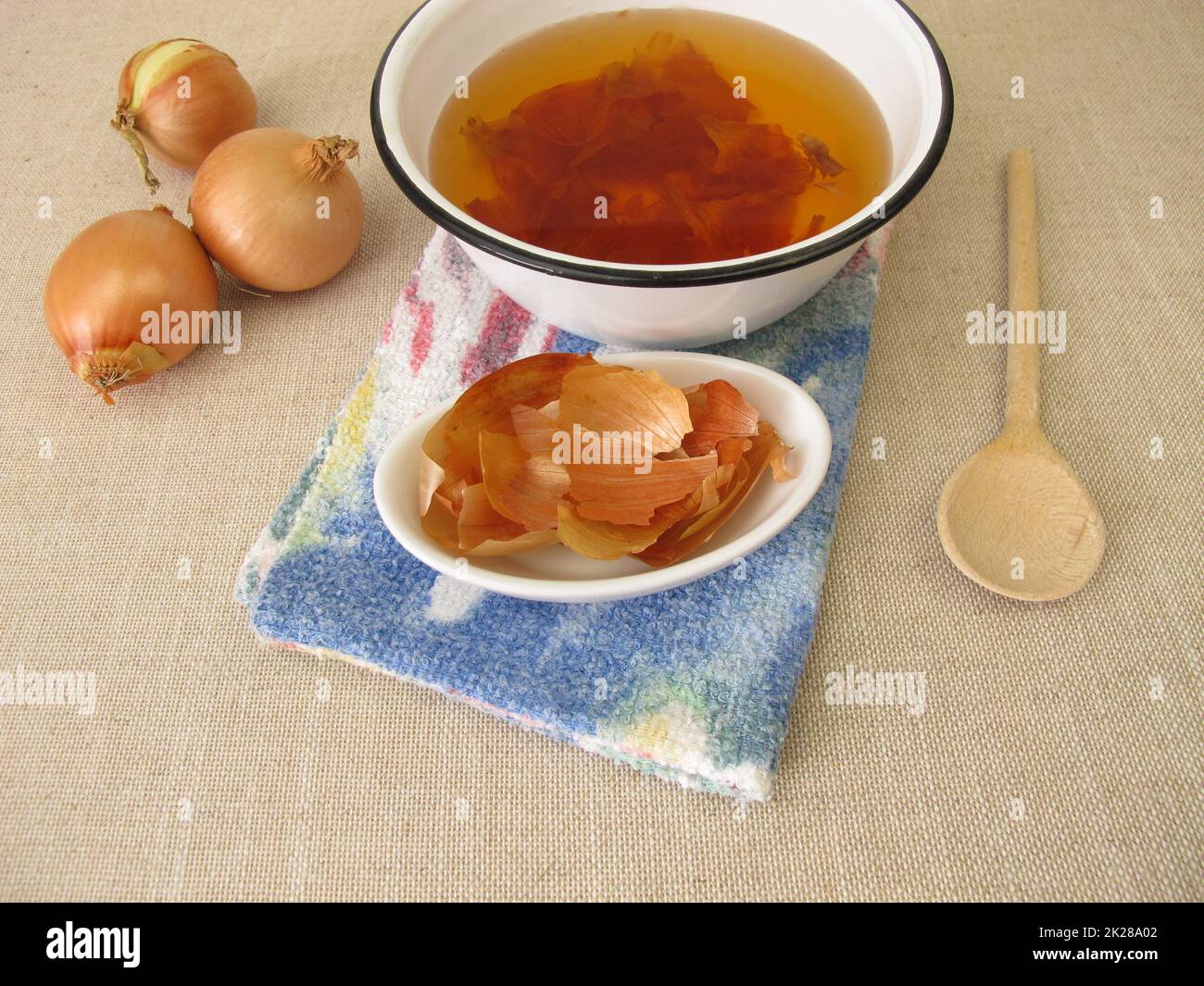 Dye agent, brown decoction from onion peel Stock Photo Alamy