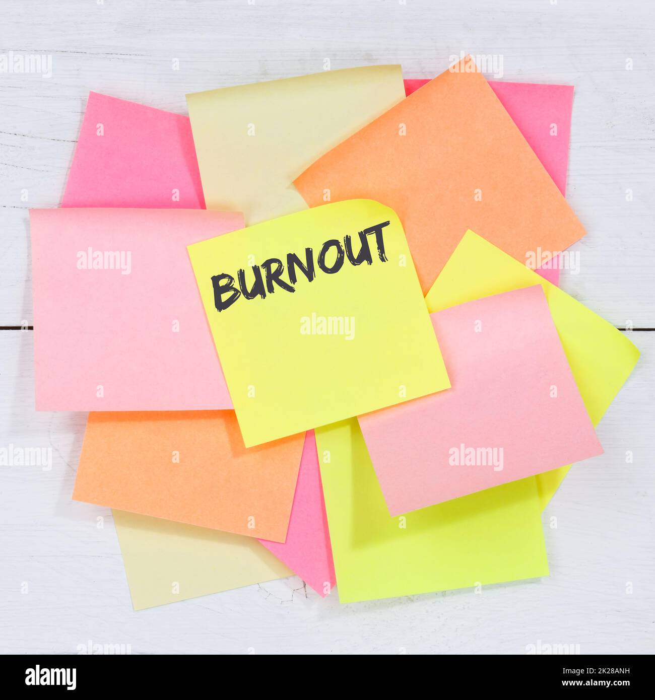 Burnout ill illness stress stressed at work business concept desk note paper Stock Photo