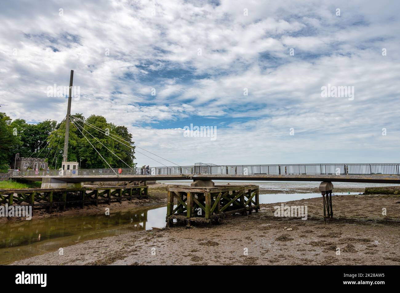 Caernarfon, UK- July 10, 2022: The swing bridge at low tide in Caernarfon in North Wales, also known as Pont Yr Aber Stock Photo