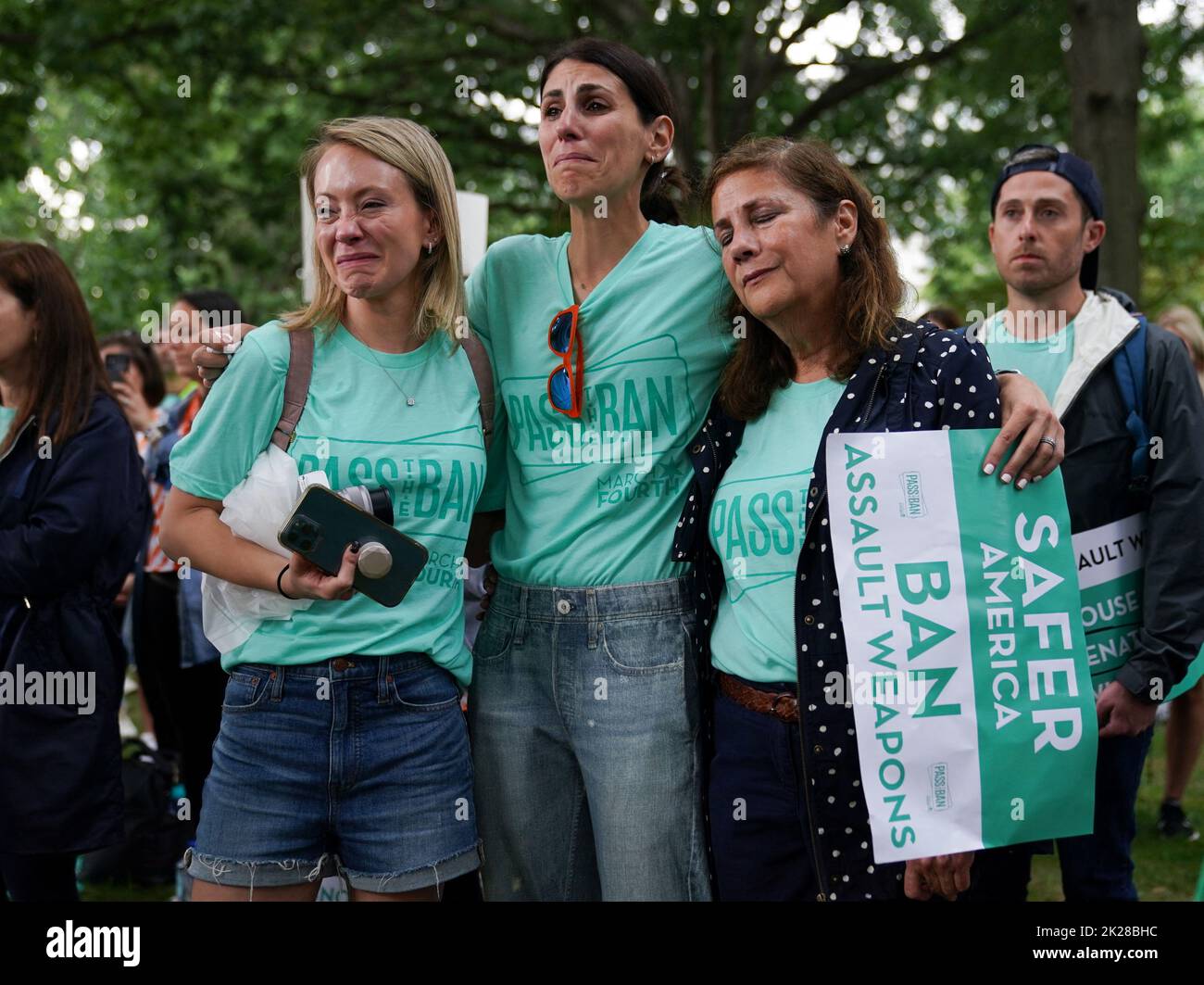 Women react to a speaker during a rally calling on Congress to pass legislation banning assault style weapons, at the U.S. Capitol in Washington, U.S., September 22, 2022. REUTERS/Kevin Lamarque Stock Photo