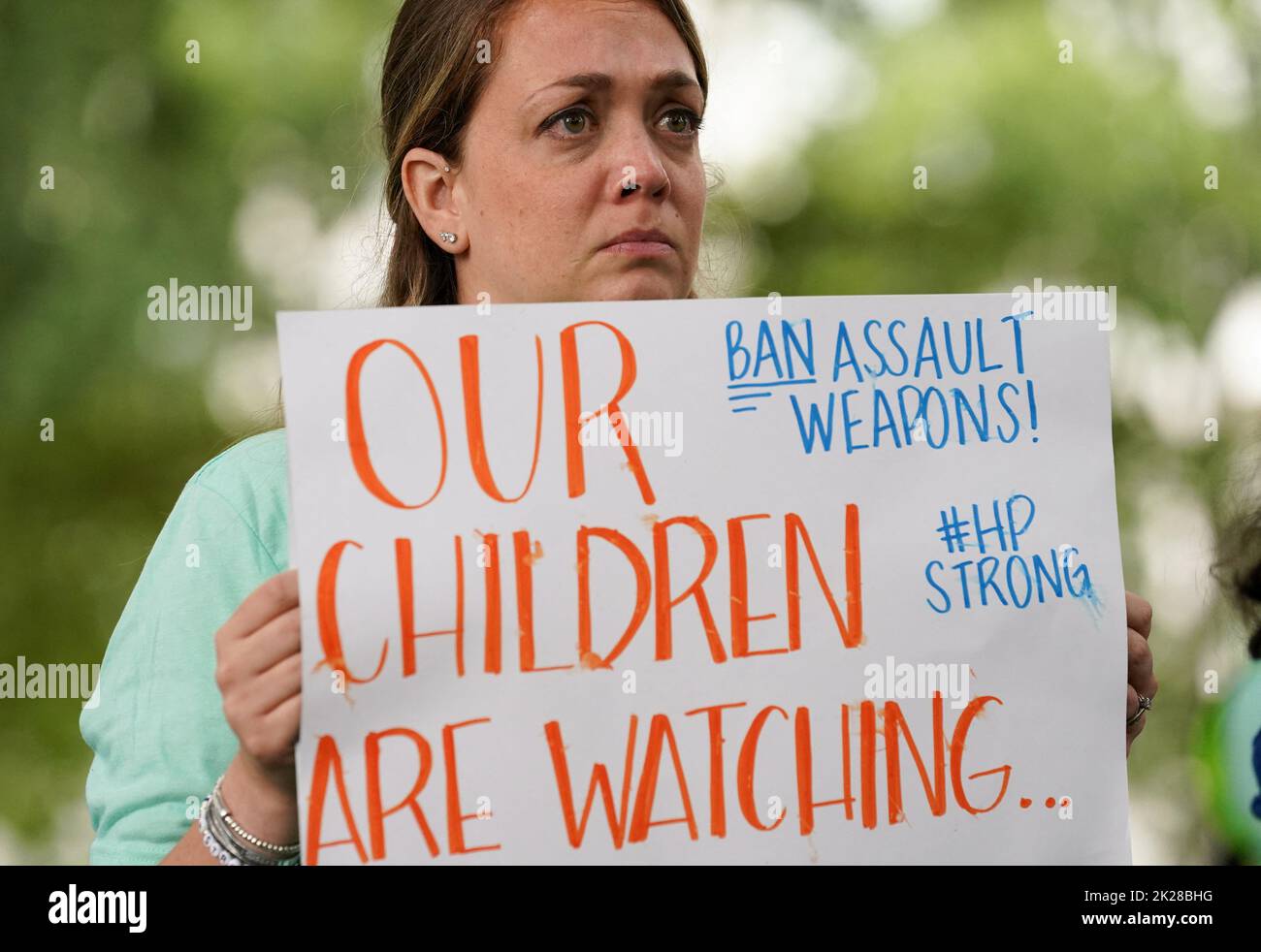 An activist takes part in a rally calling on Congress to pass legislation to ban assault style weapons, at the U.S. Capitol in Washington, U.S., September 22, 2022. REUTERS/Kevin Lamarque Stock Photo