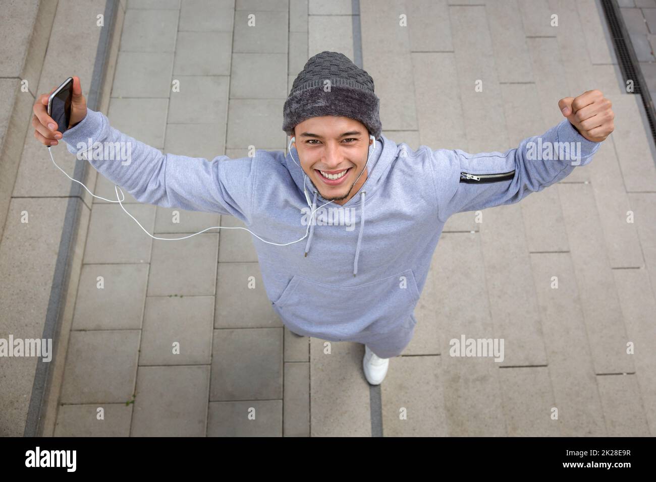 Successful happy smiling young latin man fitness sport sports joy pleasure Stock Photo