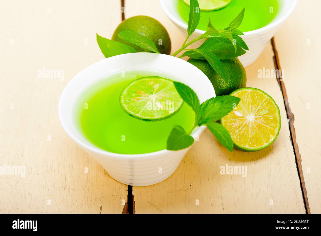 mint infusion tea tisane with lime Stock Photo - Alamy