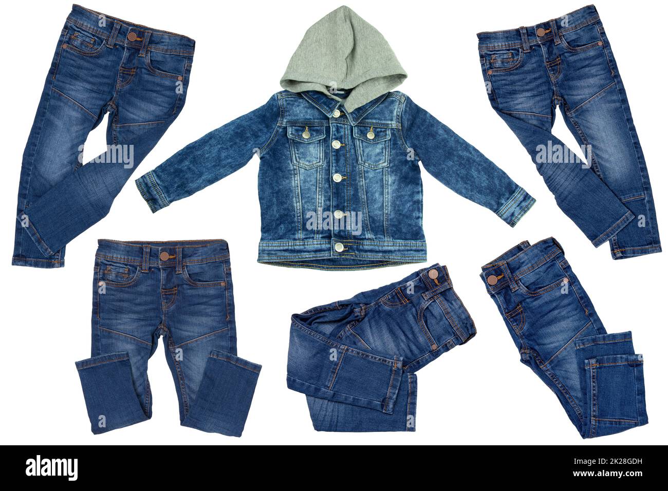 Collection jeans clothes on white background. Set of a denim jacket with detachable hood for child boy and various trendy stylish blue denim stretch pants or trousers. Jeans summer and autumn fashion. Stock Photo