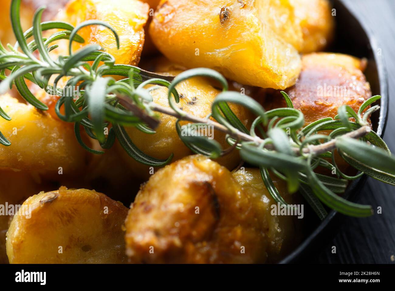 rustic golden english roasted duck fat potatoes Stock Photo