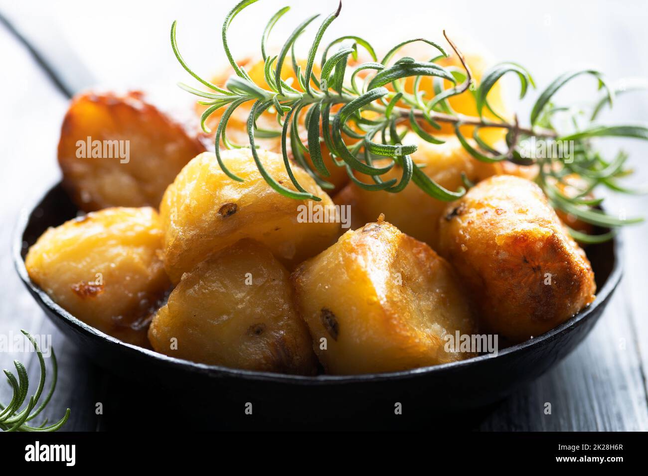 rustic golden english roasted duck fat potatoes Stock Photo