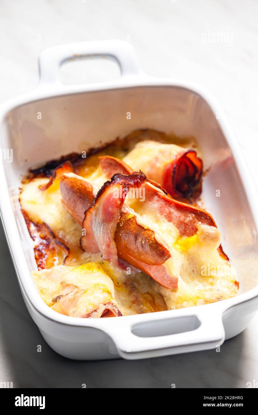 wurst in bacon baked with chedar cheese Stock Photo