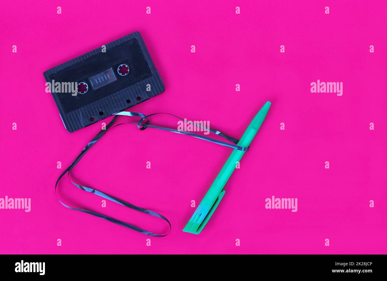 In the 90s you needed a pen to wind a broken tape of a music cassette Stock Photo