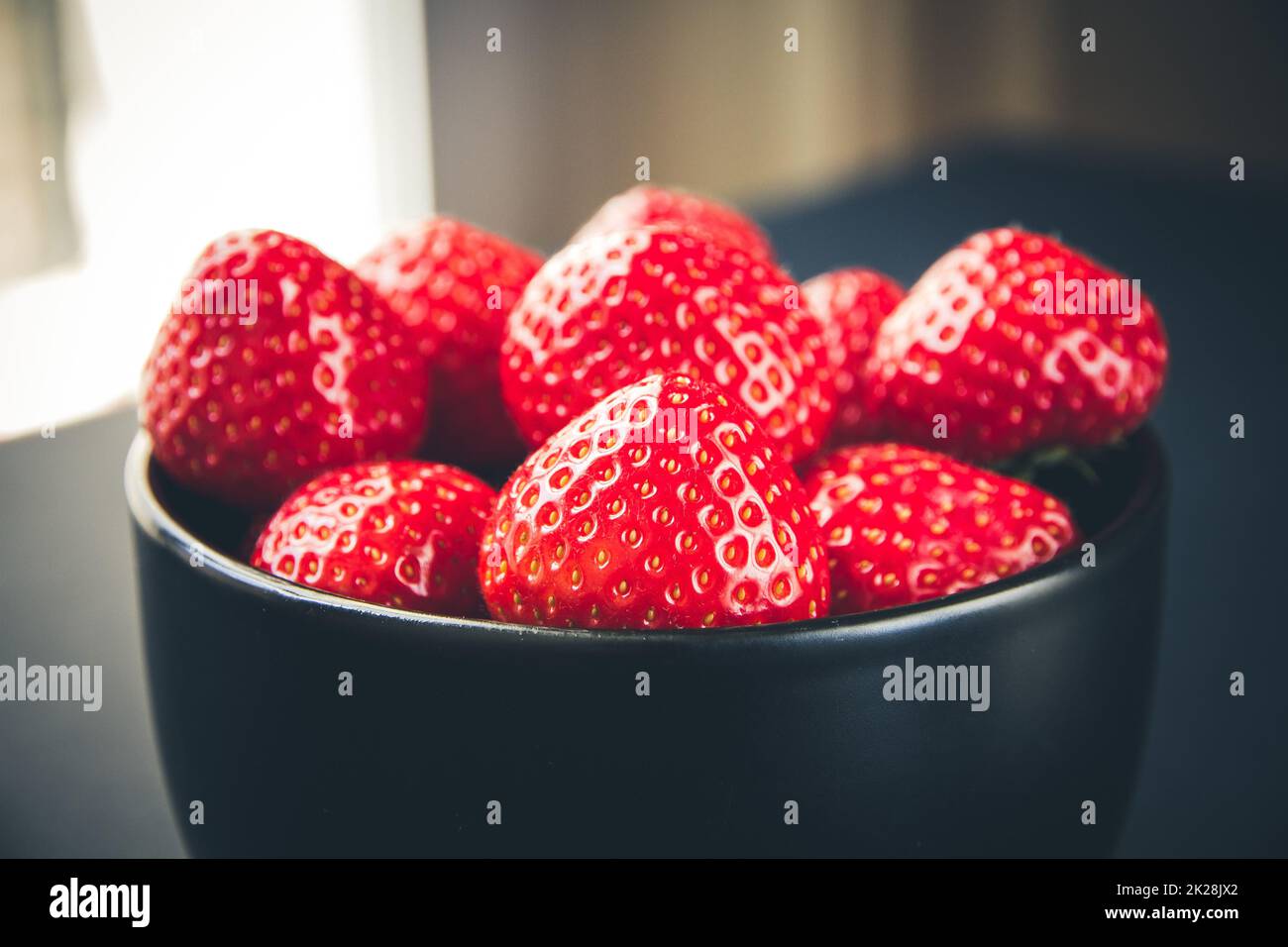 Strawberries in a bowl Stock Photo