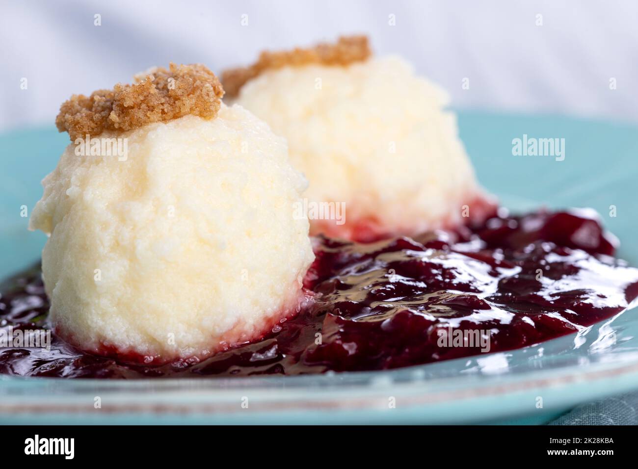 austrian curd noodles on plum sauce Stock Photo