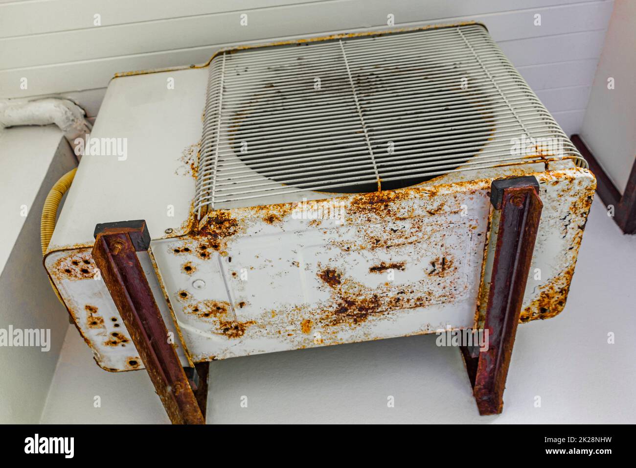 Dirty old rusted air conditioner at hotel room in Nai Thon Naithon