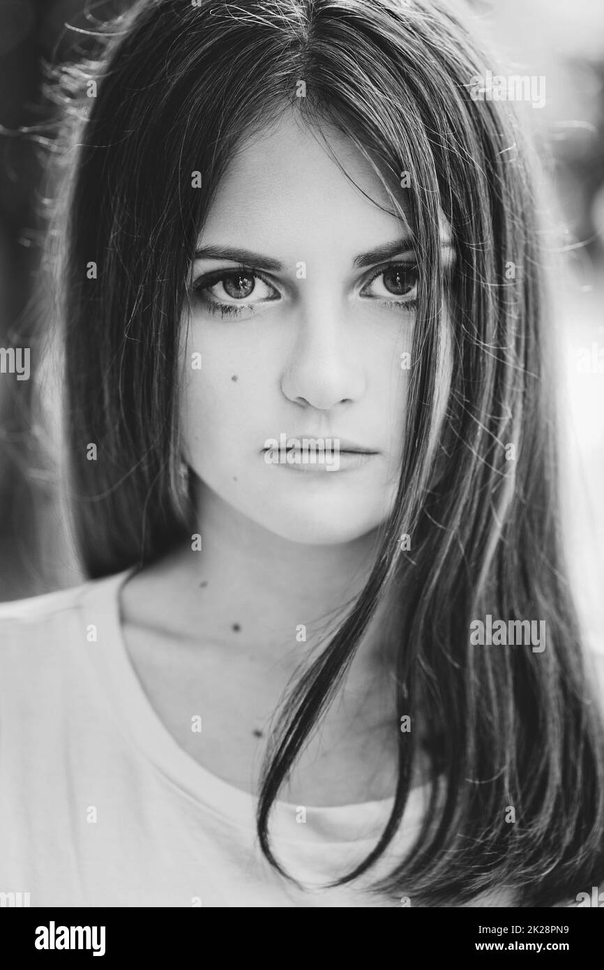 Portrait of a teenage girl with long hair Stock Photo - Alamy