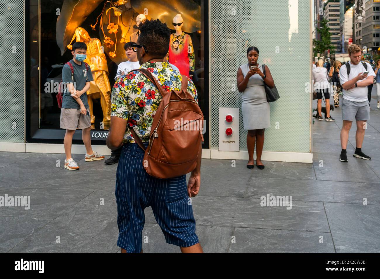 Fashionista in front of the Louis Vuitton store in Midtown Manhattan in New York on Wednesday, September 14, 2022. (© Richard B. Levine) Stock Photo