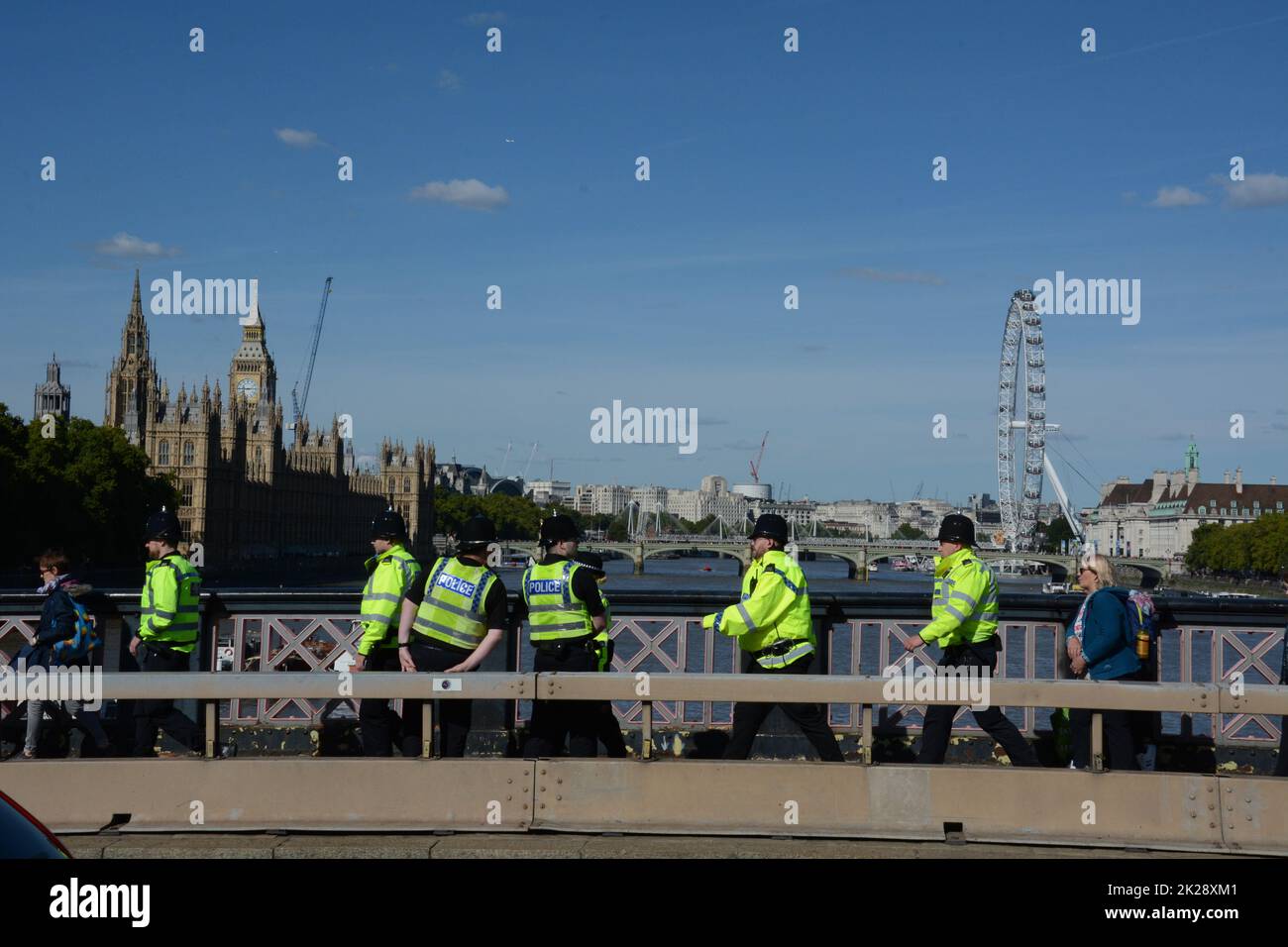 Police on Lambeth Bridge heading for Victoria Gardens along the same