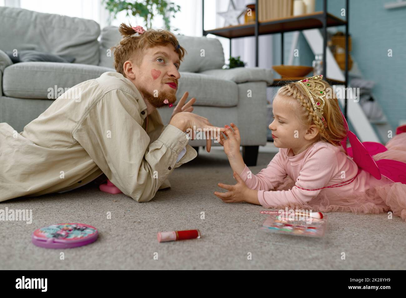 Father with funny makeup and daughter Stock Photo