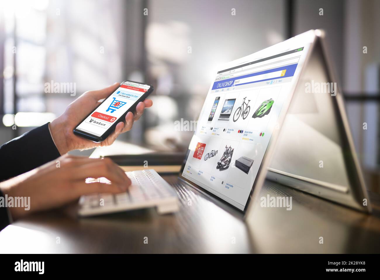 Online Ecommerce Shopping On Convertible Laptop Stock Photo