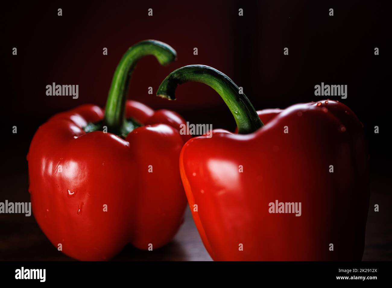 Two red pepper arranged together Stock Photo