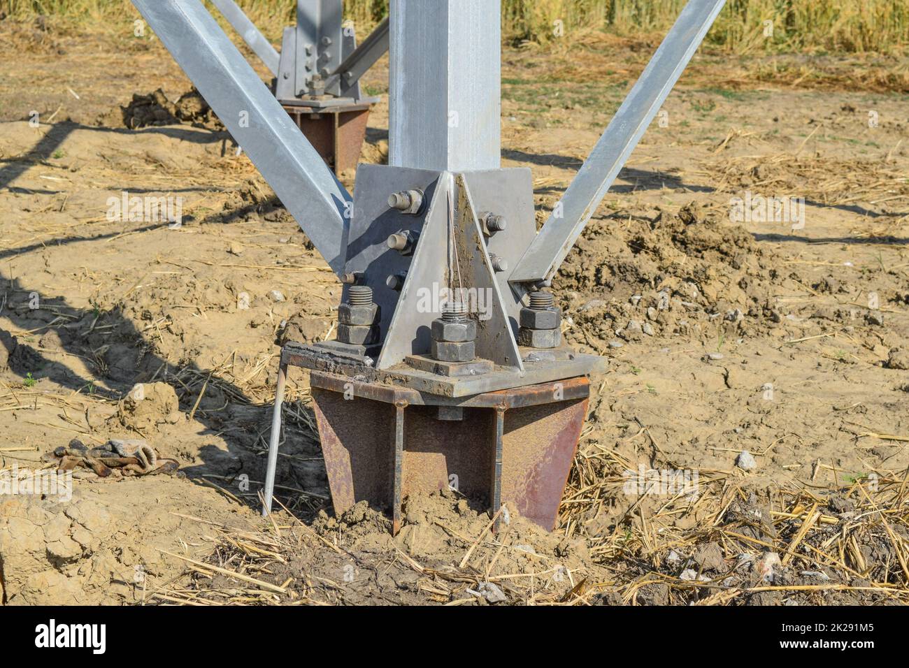 The base supports the mast foot power line Stock Photo