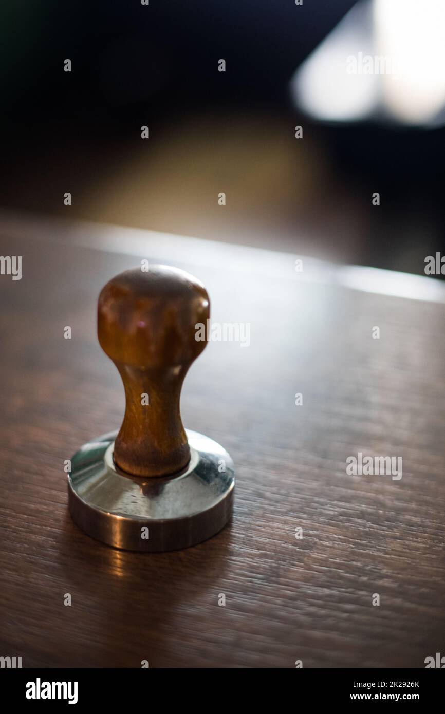 Tamper used in making espresso coffee Stock Photo Alamy