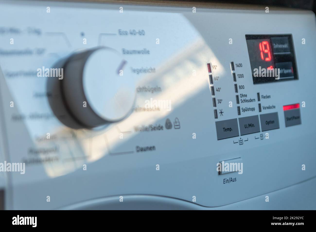 Detail view of washing machine control panel with contemporary ...